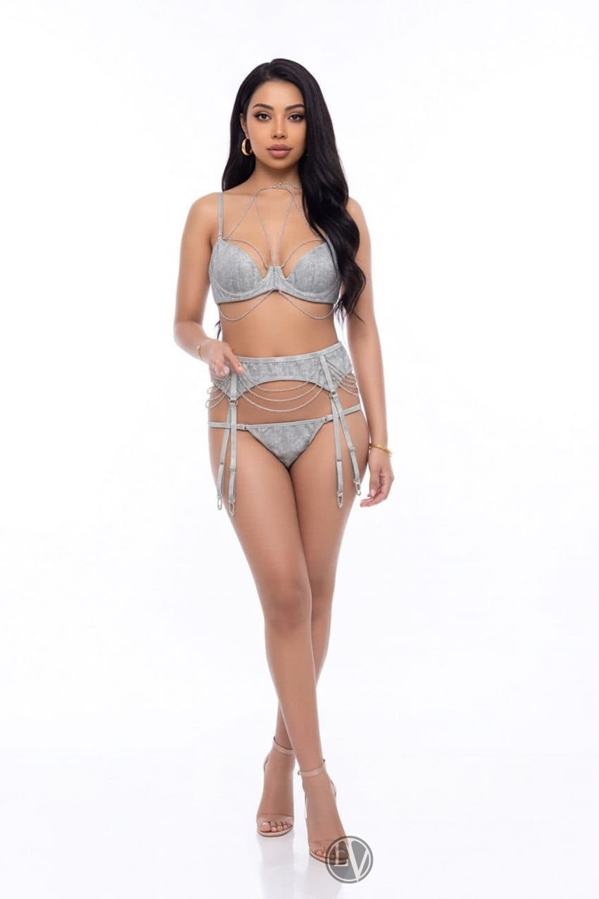 Priti displays a natural blend of sensuality and grace in her captivating pose.
