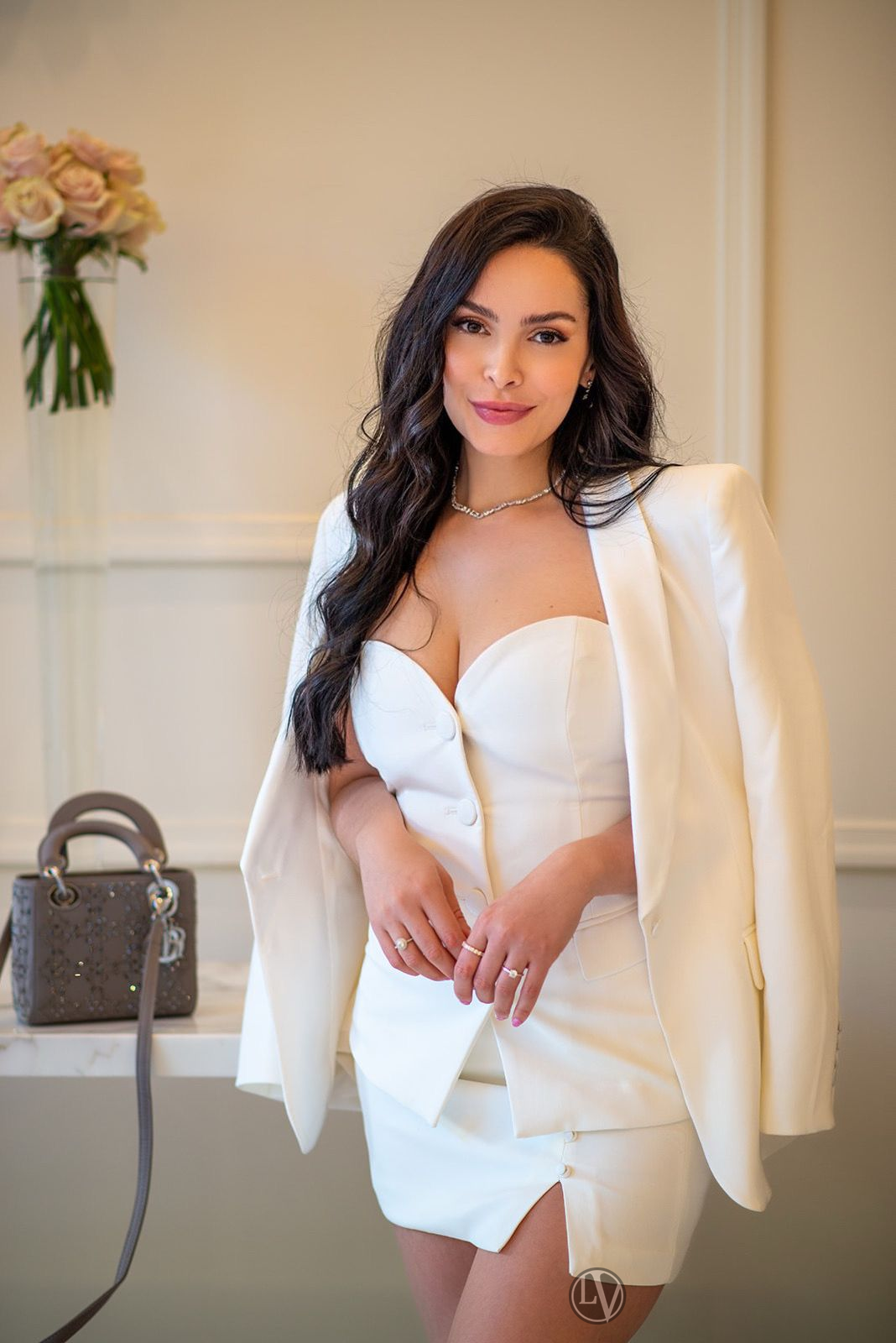 Rebecca shines with a captivating charm and elegance that truly stands out.