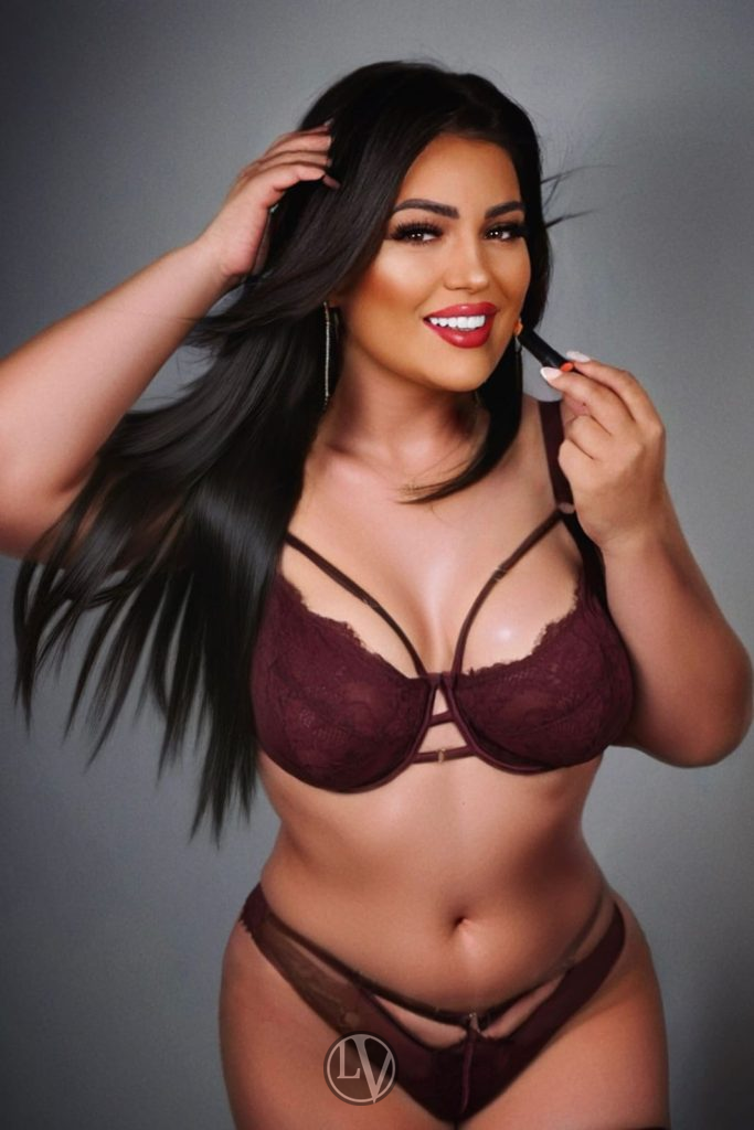Paulina has a graceful posture, and her expressive eyes shine with a warm, gentle light.