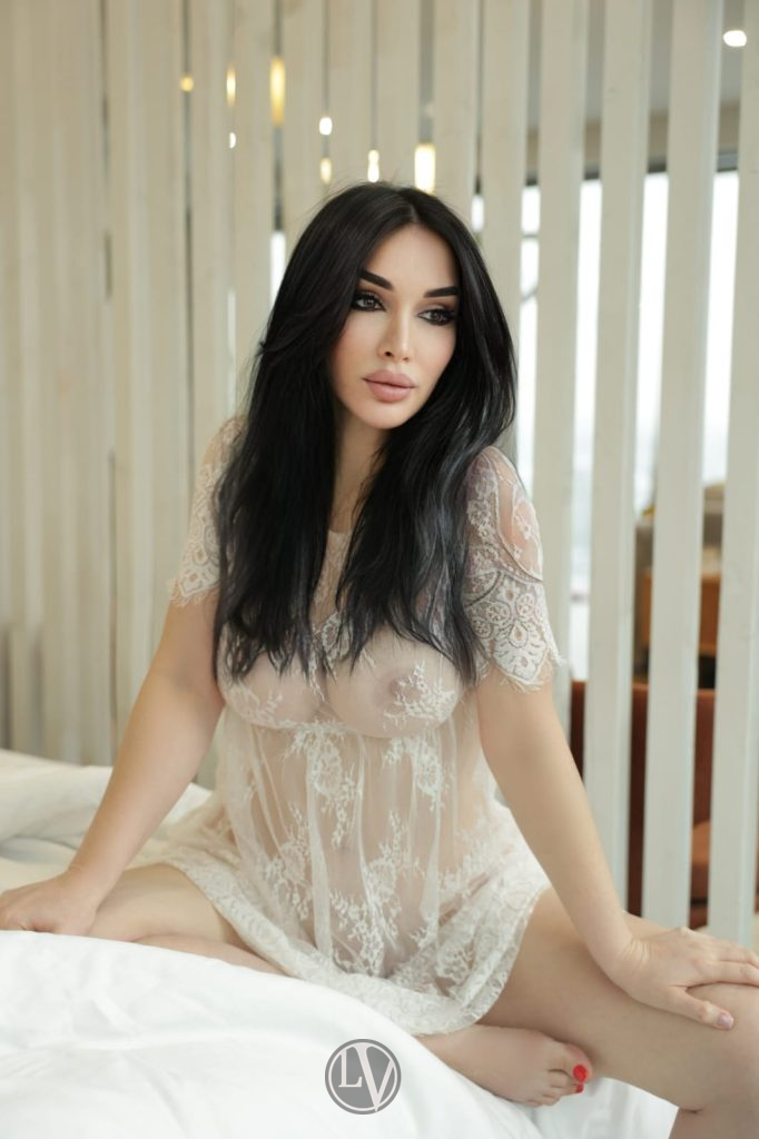 An elegant model showcasing stylish clothing with grace and confidence.