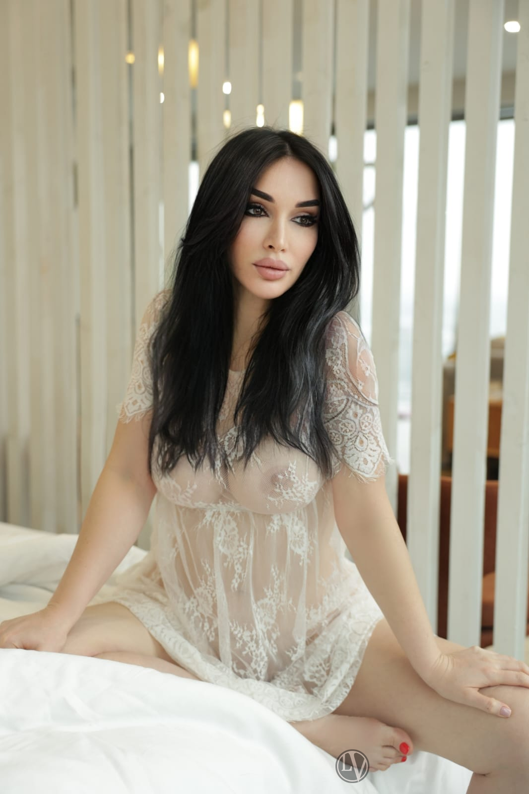 An elegant model showcasing stylish clothing with grace and confidence.