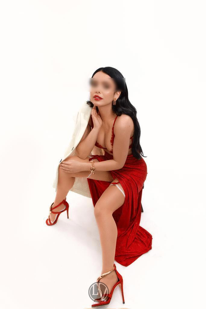Agency escort Miley in her sexy lingerie looking sensual