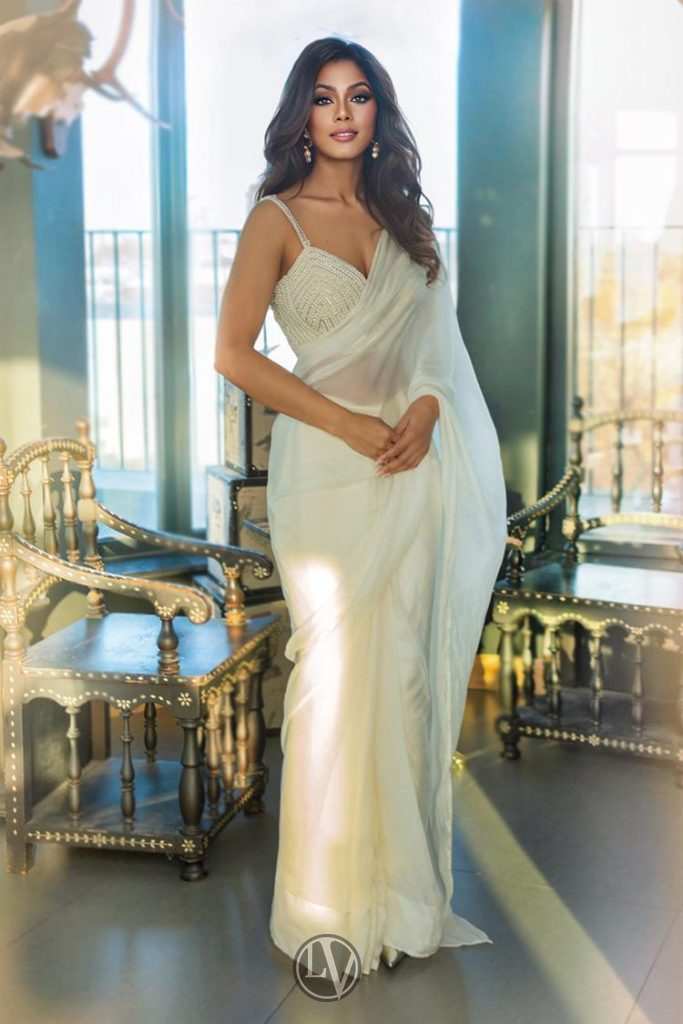 Sabrina radiates confidence and grace in every detail of this image.