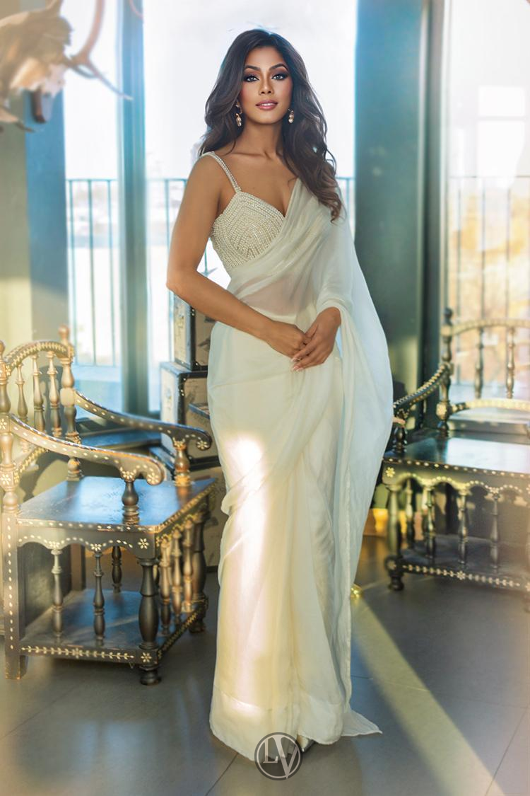 Sabrina radiates confidence and grace in every detail of this image.